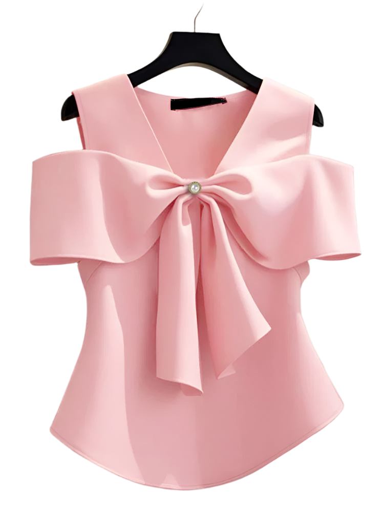 Pink blouse with a large bow on a hanger against a neutral background