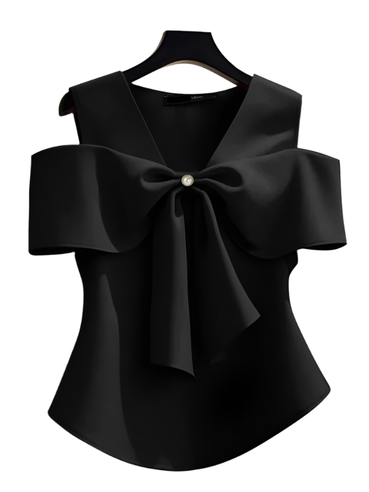 Black blouse with a large bow on a hanger against a neutral background