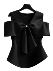 Black blouse with a large bow on a hanger against a neutral background