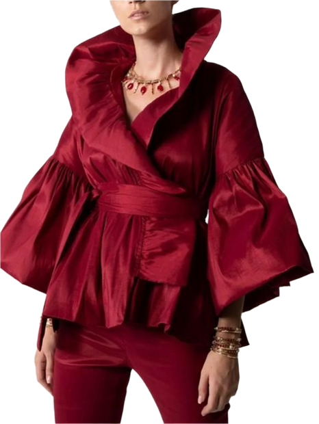 Red outfit with ruffled sleeves on a plain background
