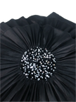 Black pleated clutch with a central sequin embellishment on a white background