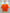 Orange ruffled top on a hanger against a white background