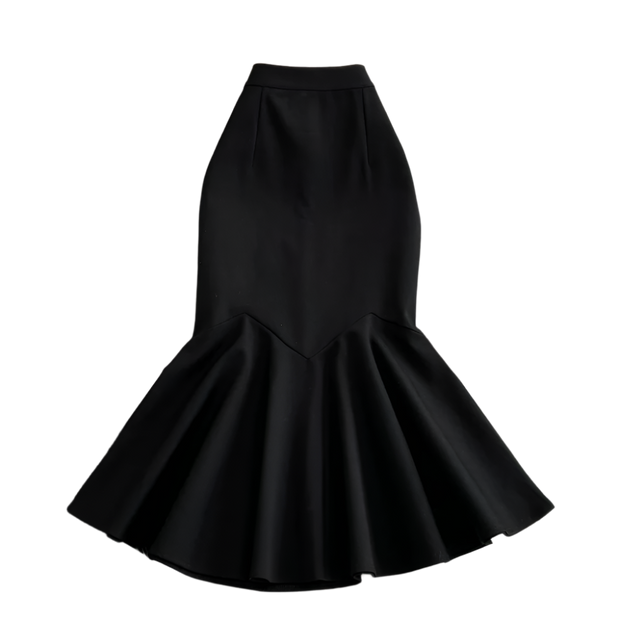 Black mermaid-style skirt on a textured surface with flowers.