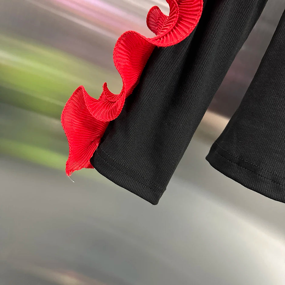 Spliced Turtleneck Petal Sleeve Blouse