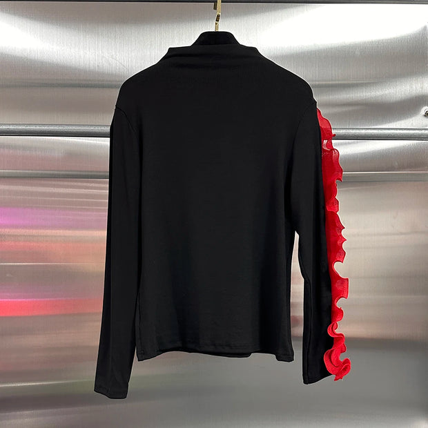 Spliced Turtleneck Petal Sleeve Blouse