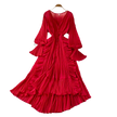 Red pleated dress on a hanger against a neutral background